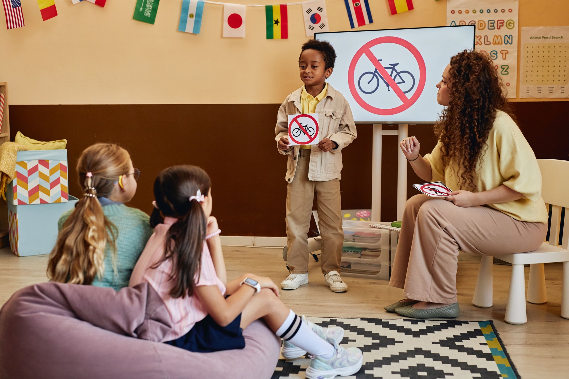Boy Holding Sign Presenting Road Safety Rules